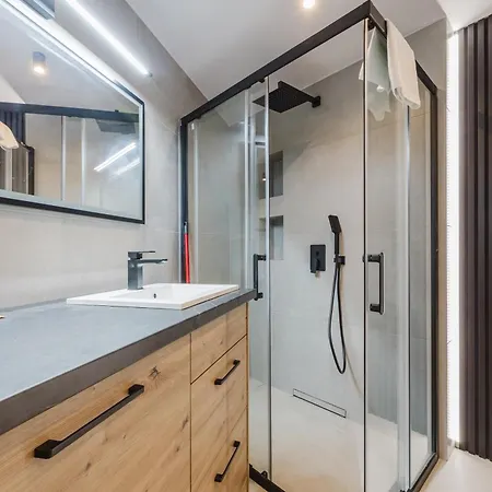 Апартаменти Osiedle Piastowskie Mezzanine By Bookinghost Познань